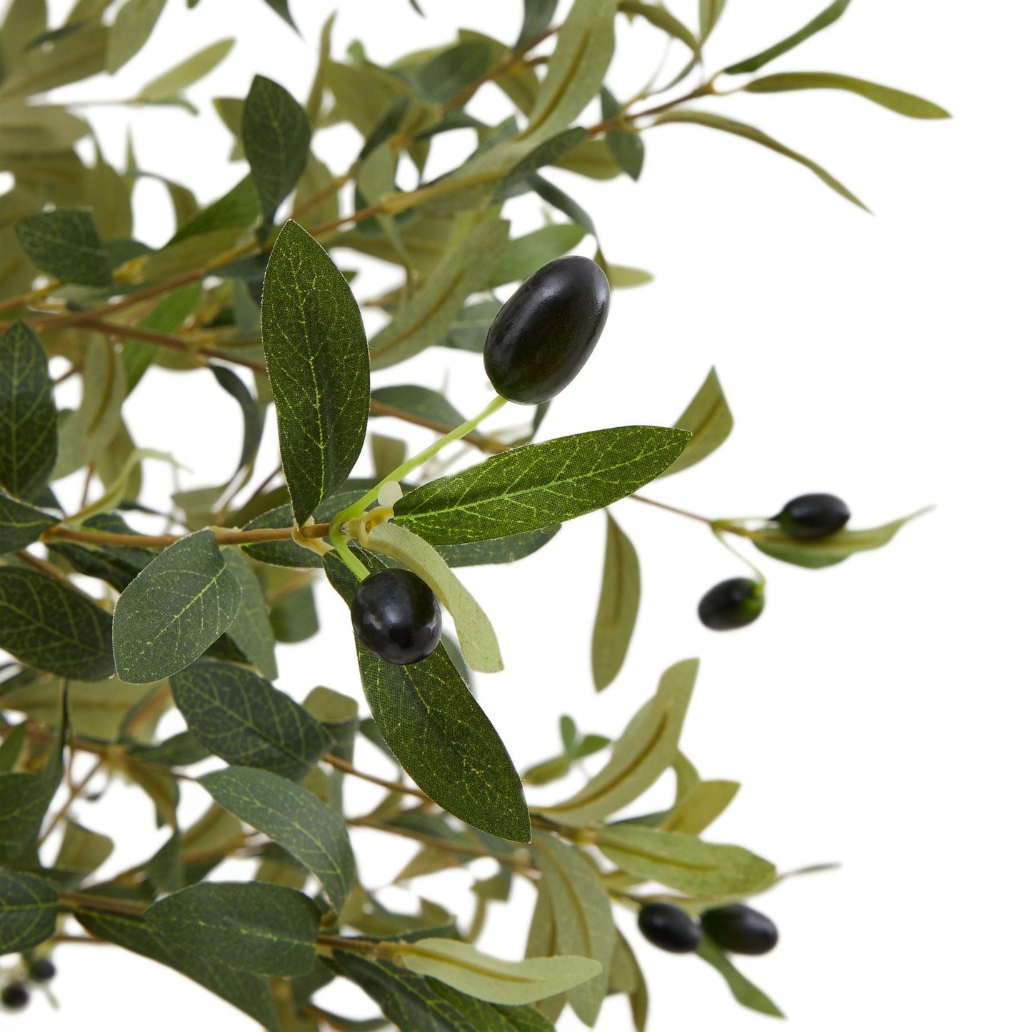close up of the olives and leaves on artificial olive tree