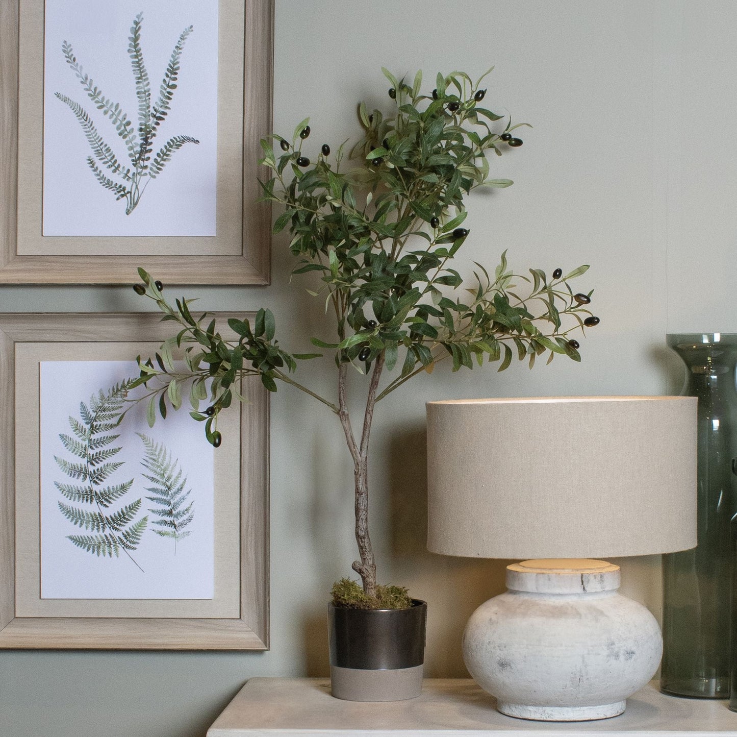 small artificial olive tree next to lamp
