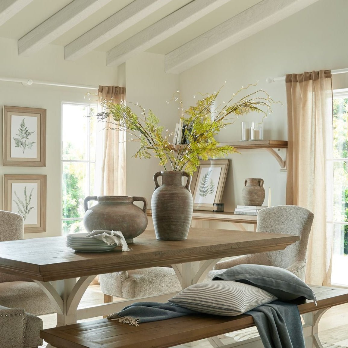 Bracken Fern Stem in amphora vase on dining table