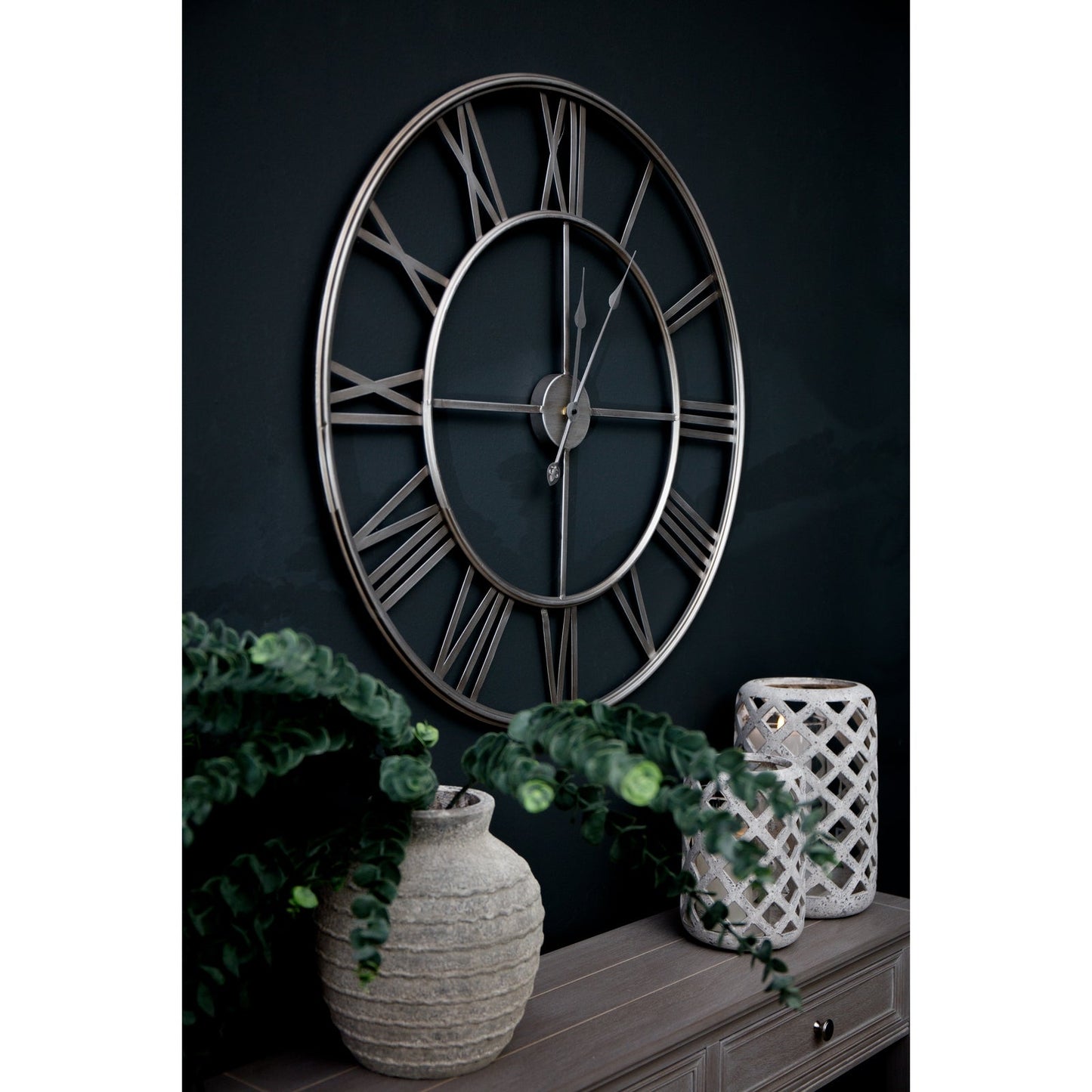 Silver Skeleton Clock above Camille Console Table
