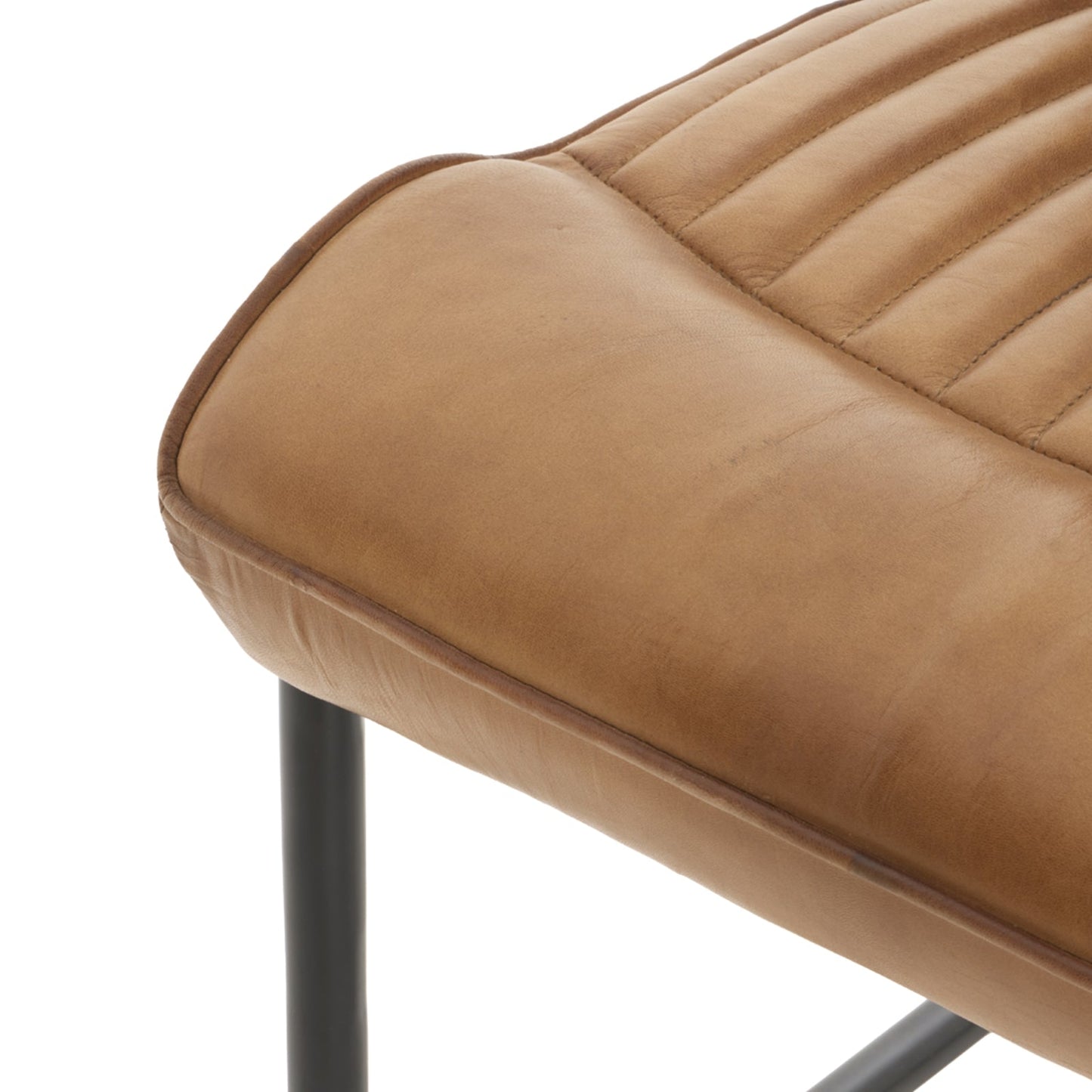 seat pad on the tan real leather dining chair