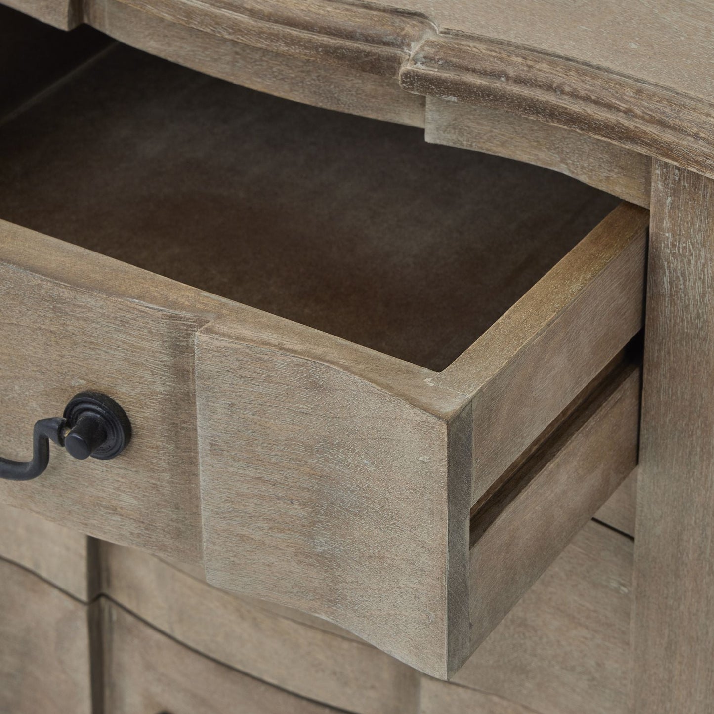 open drawer on wooden bedside table 3 drawers