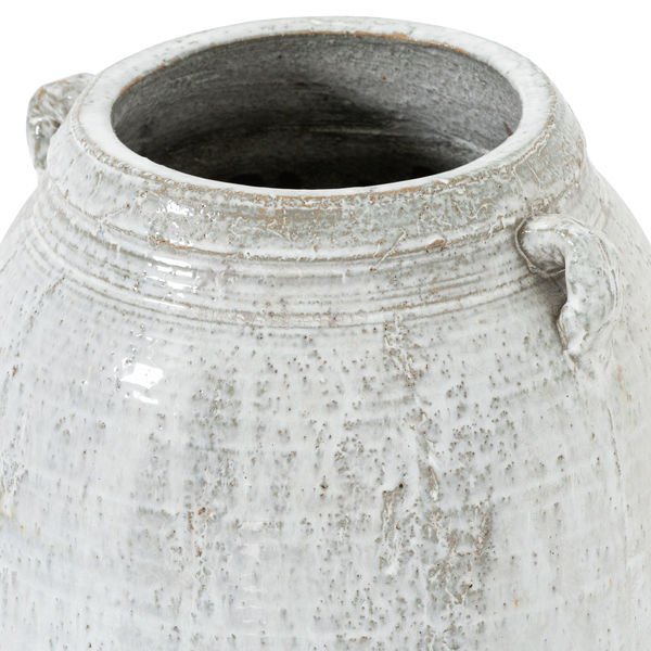 close up of large vase showing handle and distressed finish details