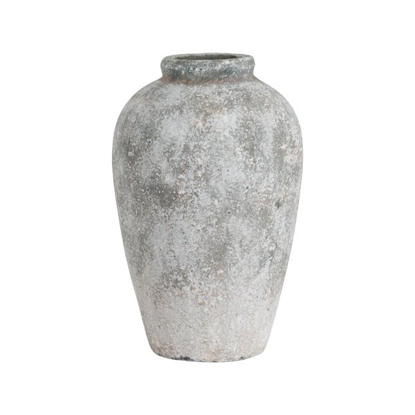 Tall aged stone vase