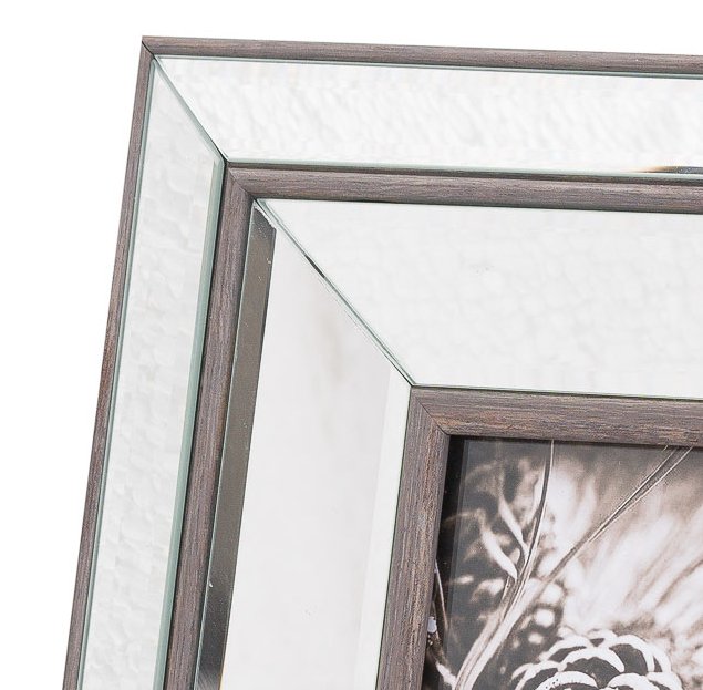 close up showing the wood detail inlay to the photo frames
