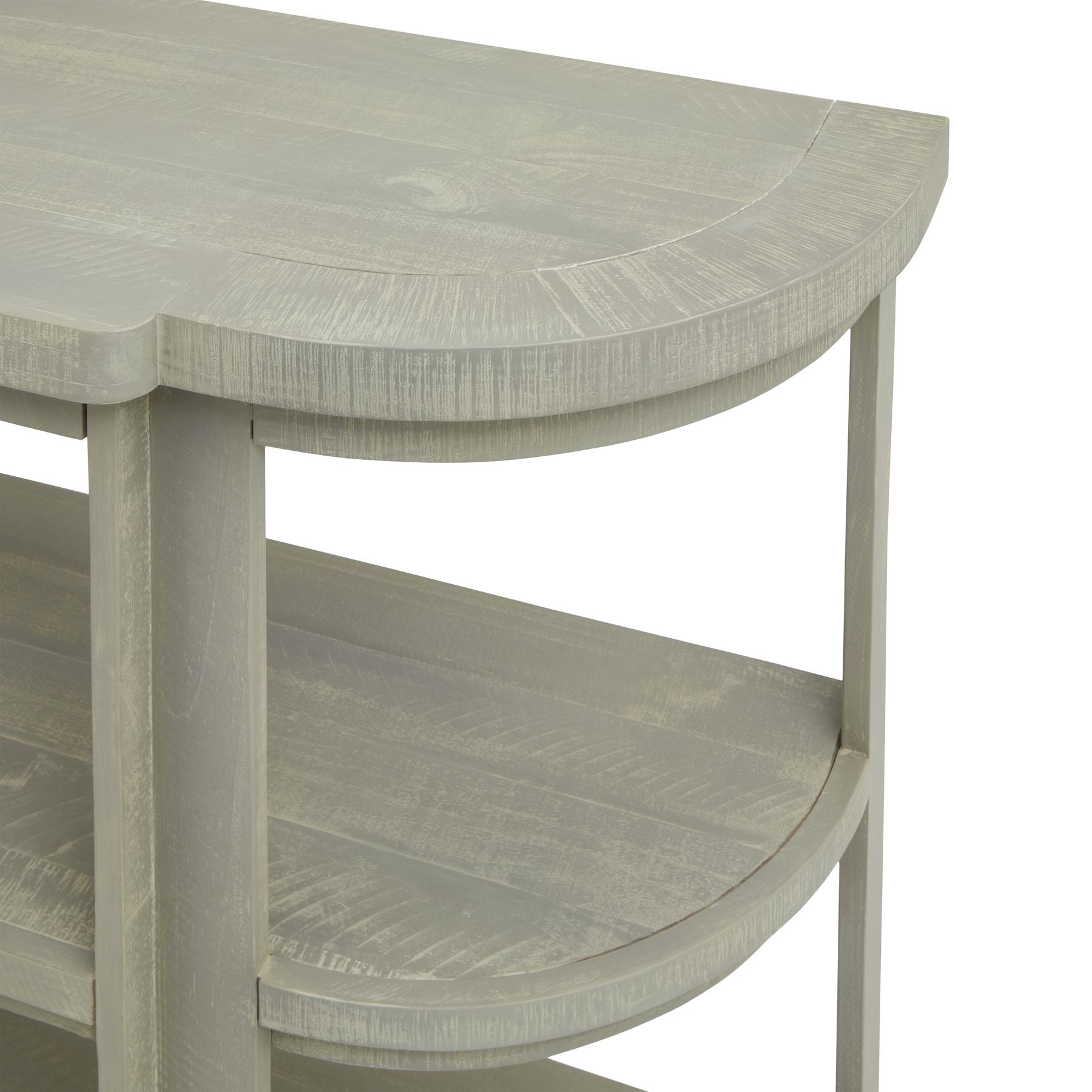 close up of the corner on the console table showing lower shelves