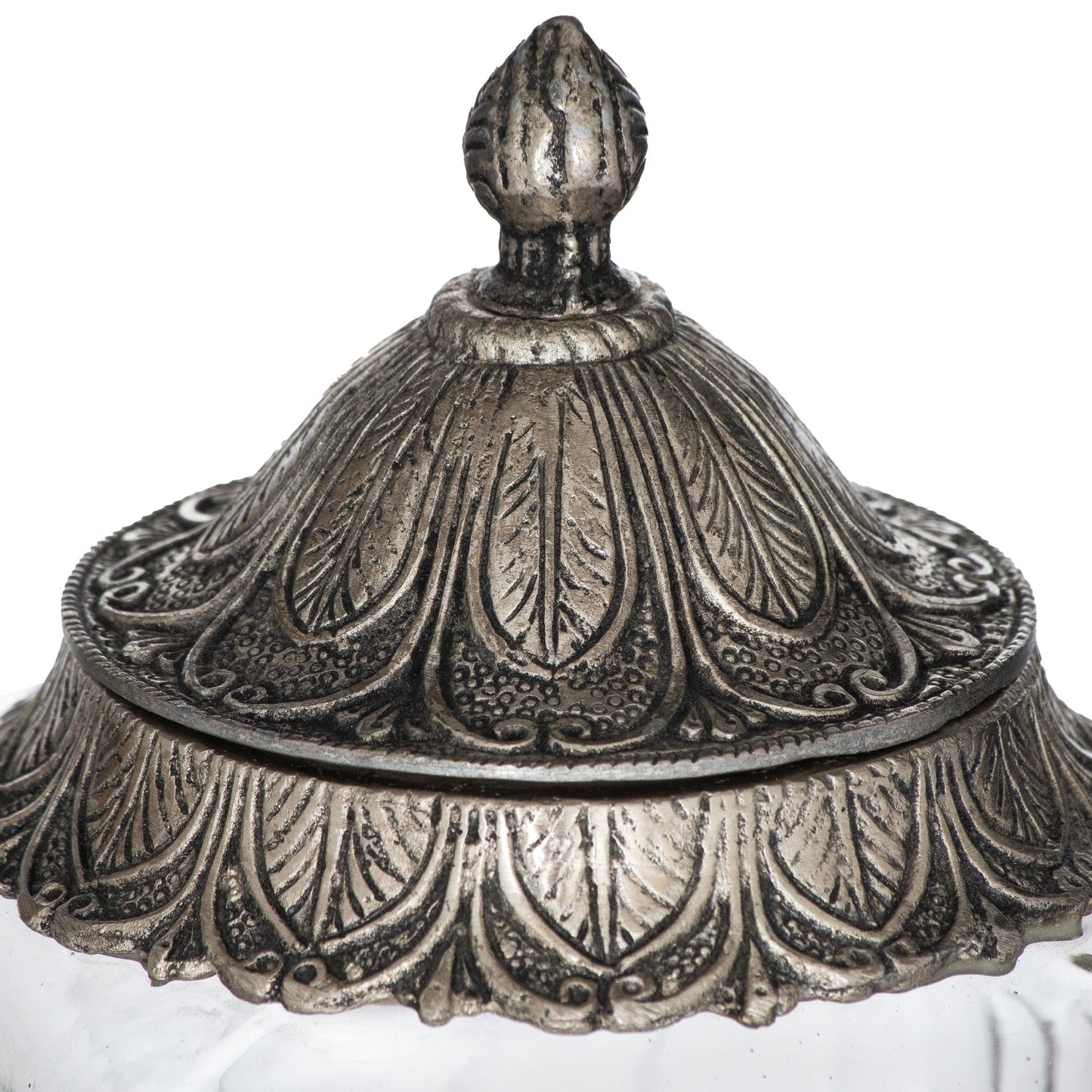 close up of the metal lids with the intricate detail and finial top